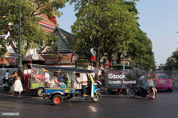 Bangkok Tuktuk Taxi In Traffic Thailand Stock Photo - Download Image Now - Bangkok, Capital Cities, Editorial