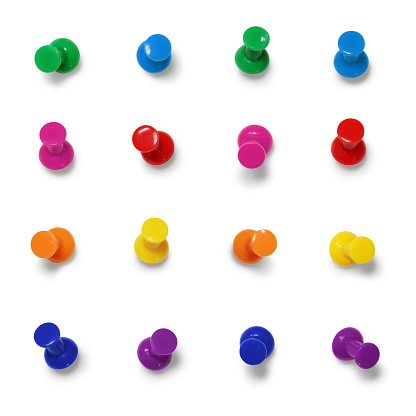Collection of sixteen colorful thumbtacks isolated on white (excluding the shadow)