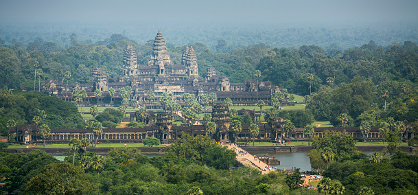 The temple of Angkor Wat is one of the 7 wonder of the world and is the pride of today's Cambodia in South East Asia. The view is taken from the air from a long distance.