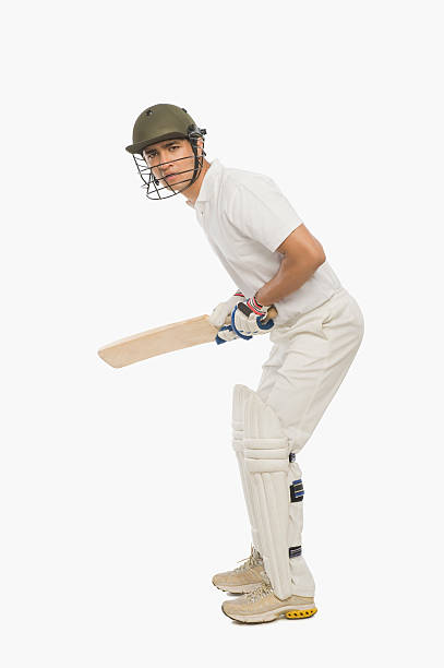 istock Cricket batsman playing a defensive stroke 493513318