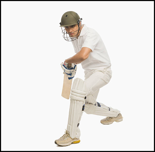 istock Cricket batsman playing a defensive stroke 493513726