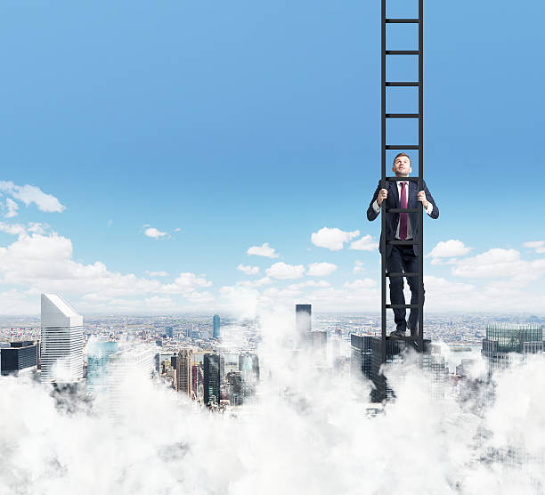 istock businessman is climbing up the ladder. 493514034