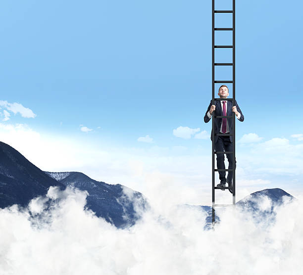 istock businessman is climbing up the ladder. 493514084