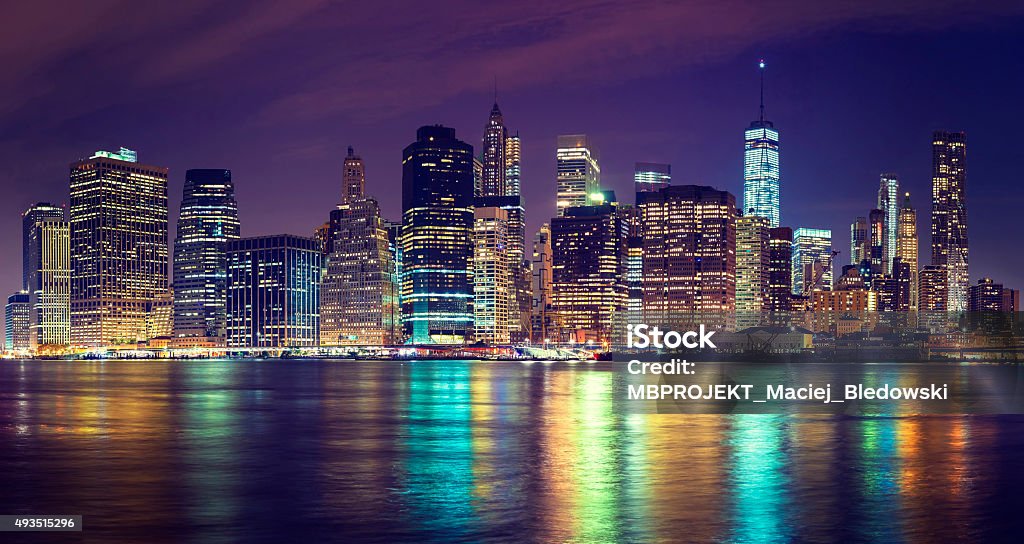 Vintage toned Manhattan skyline at night, NYC, USA. New York City Stock Photo