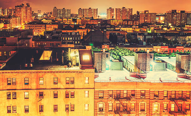 retro tonos harlem alrededores de noche, nueva york, estados unidos. - the bronx fotografías e imágenes de stock