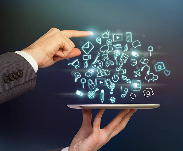 istock businessman's hands is pointing out the specific icon 493516108