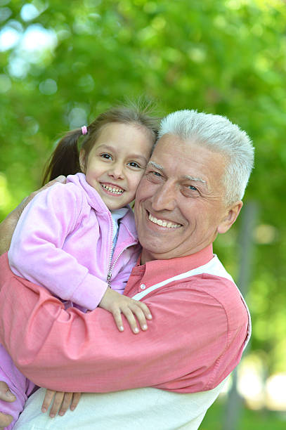 istock Grandfather and  granddaughter together 493516542