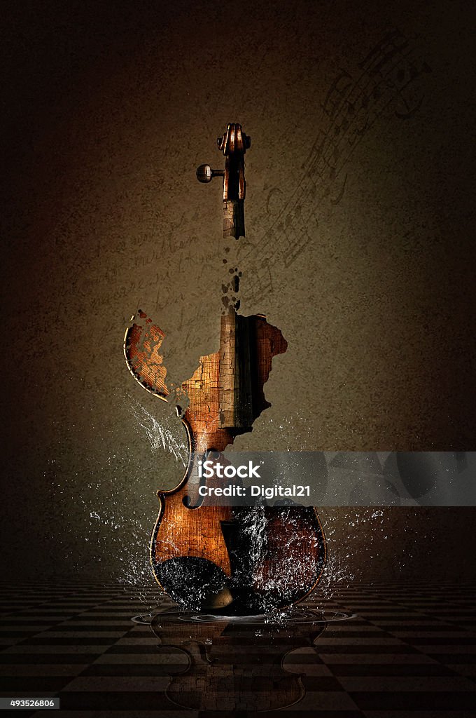 Shattered Violin with Water Shattered Violin with water splashes amidst a dark grungy scene. Violin Stock Photo