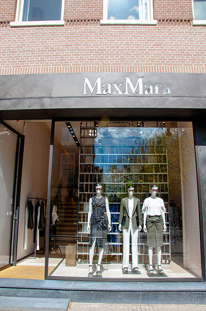 Max Mara store in the P.C.Hooftstraat shopping street in Amsterdam. Amsterdam, the Netherlands - April 30, 2015: Max Mara store in the P.C.Hooftstraat shopping street. victoria beckham stock pictures, royalty-free photos & images