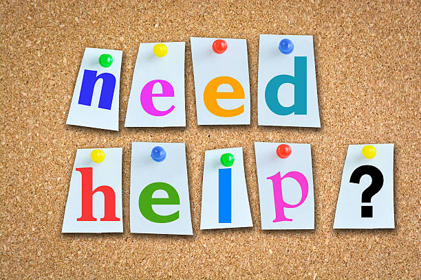 istock Help message with memo papers on cork billboard and pins 493534224