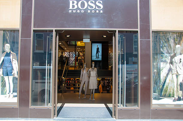 Boss store in the P.C.Hooftstraat shopping street in Amsterdam. Amsterdam, the Netherlands - April 30, 2015: Boss store in the P.C.Hooftstraat shopping street. victoria beckham stock pictures, royalty-free photos & images