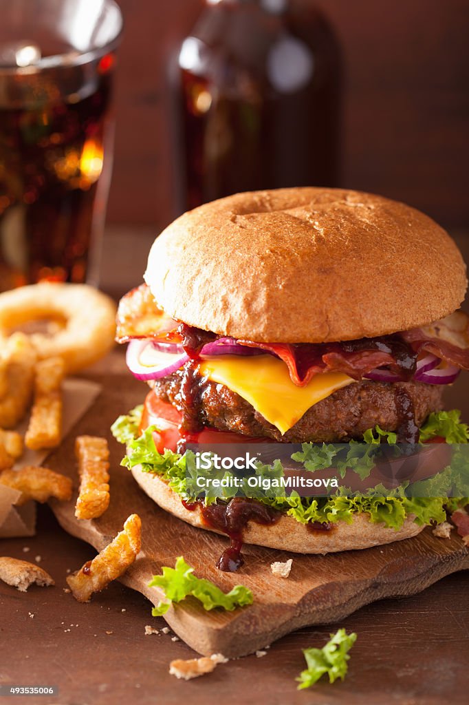 bacon cheese burger with beef patty tomato onion 2015 Stock Photo
