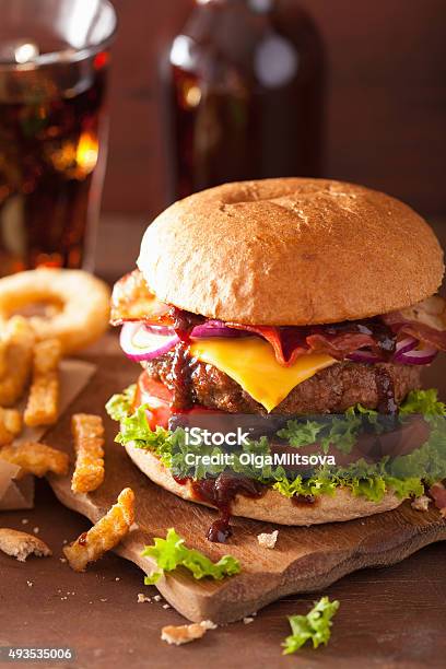 Bacon Cheese Burger With Beef Patty Tomato Onion Stock Photo - Download Image Now - 2015, American Culture, Bacon