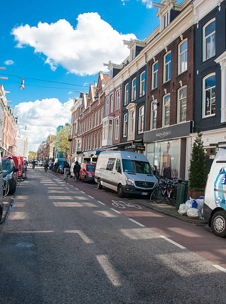 The P.C.Hooftstraat fashion street with the row of shops. Amsterdam. Amsterdam, the Netherlands - April 30, 2015: The P.C.Hooftstraat fashion street with the row of shops, people on the street. victoria beckham stock pictures, royalty-free photos & images