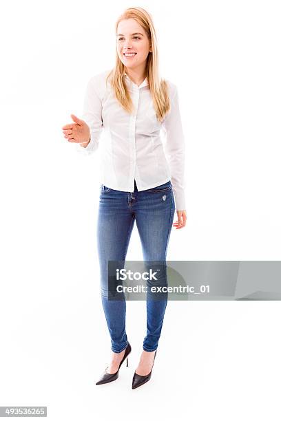 Young Woman Offering Hand For Handshake Stock Photo - Download Image Now - Long Hair, Button Down Shirt, Front View