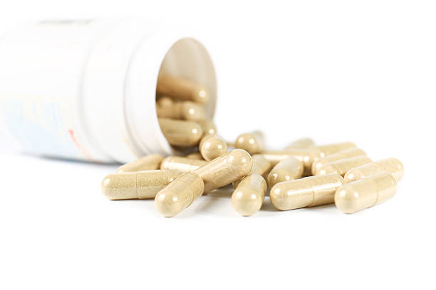 istock closeup of pills isolated on white background 493536313