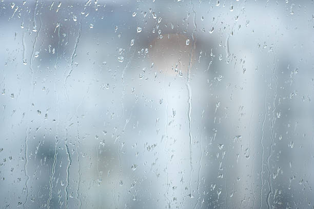Raindrops on window stock photo