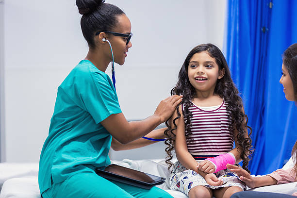 istock Pediatrician examining patient in emergency room 493537876