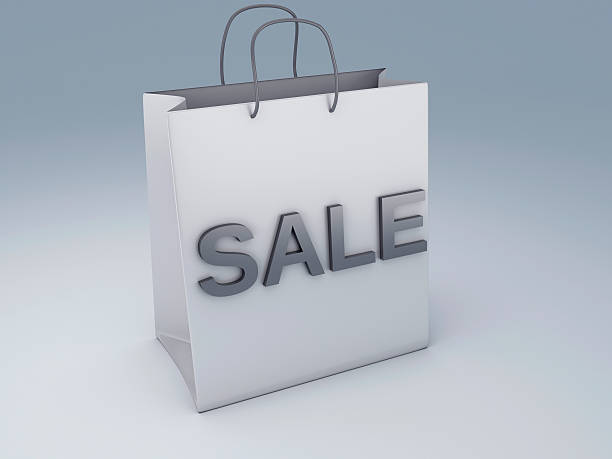 istock White shopping bag with red sale 493538339