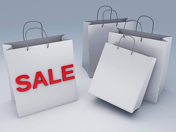 istock White shopping bag with red sale 493538349
