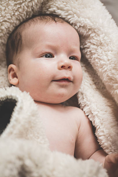 istock Baby swaddle with towel 493539364