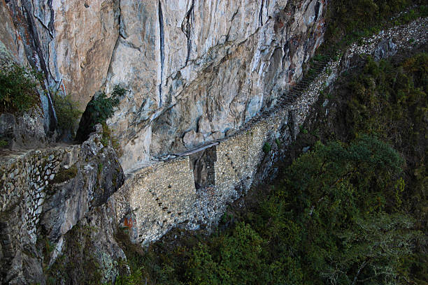 istock Peru: Inca Trail bridge near Machu Picchu 493539575