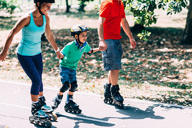 istock Beautiful family on roller blades 493540144