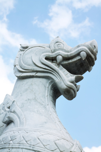 Marble dragon head of statue in temple Wat Traimit in Chinatown of Bangkok