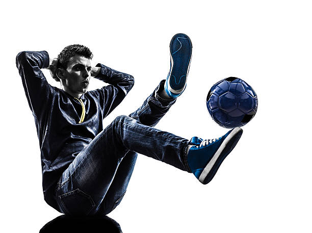 istock young man soccer freestyler player silhouette 493540773