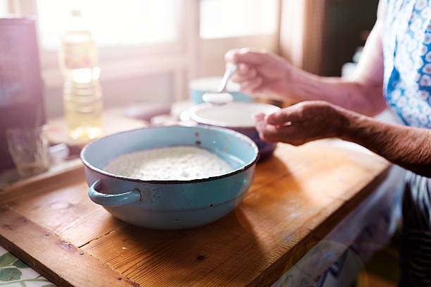 istock Senior woman baking 493550284