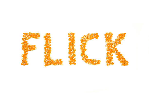 istock Popcorn Flick Movie/Film Review Pun with Unpopped Corn Kernels 493552902