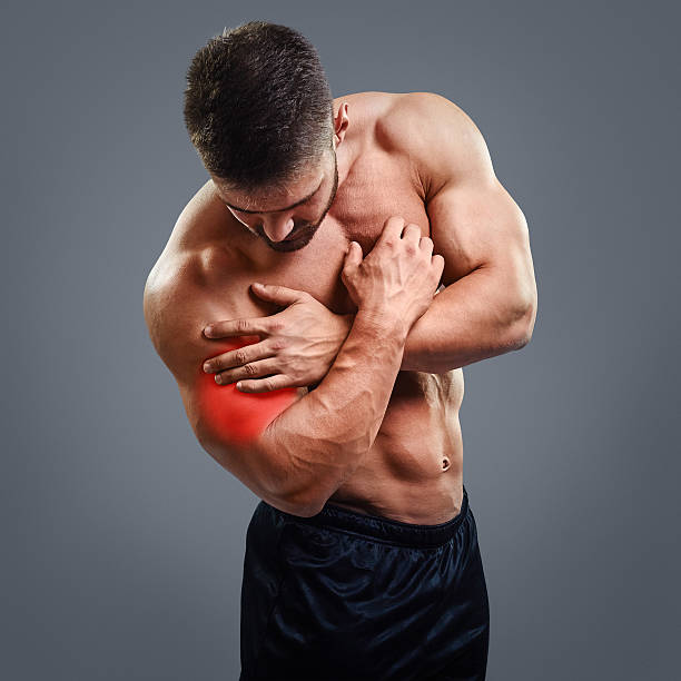 Biceps pain stock photo