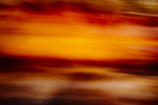 istock Blurred Orange Autumn Leaves Abstract 493553552