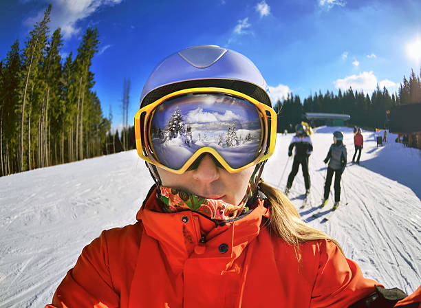 Portrait of woman in Carpathian Mountains Portrait of woman in Carpathian Mountains, Bukovel ski goggles stock pictures, royalty-free photos & images