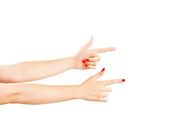 Female hands on white background - perfect indicates the direction of