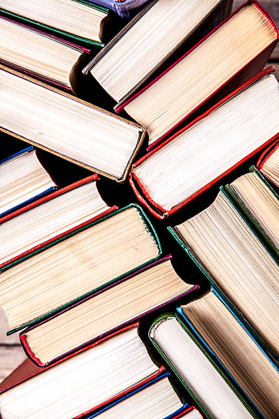 istock Old and used hardback books 493555630