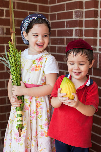 Children Celebrating Sukkot Stock Photo - Download Image Now - Judaism, Child, Family - iStock