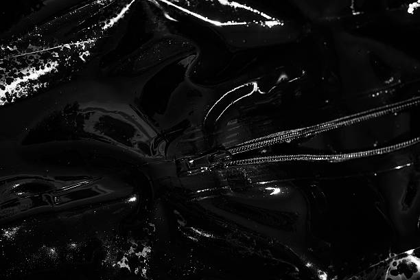 istock black latex in water 493558526