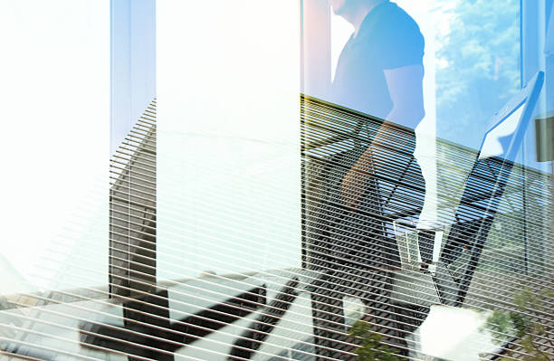 istock Double exposure of businessman working with new modern computer 493560236