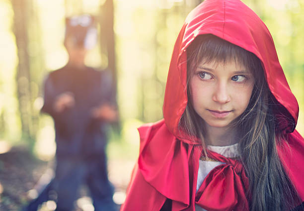 istock Little Red Riding Hood noticing the wolf 493564253