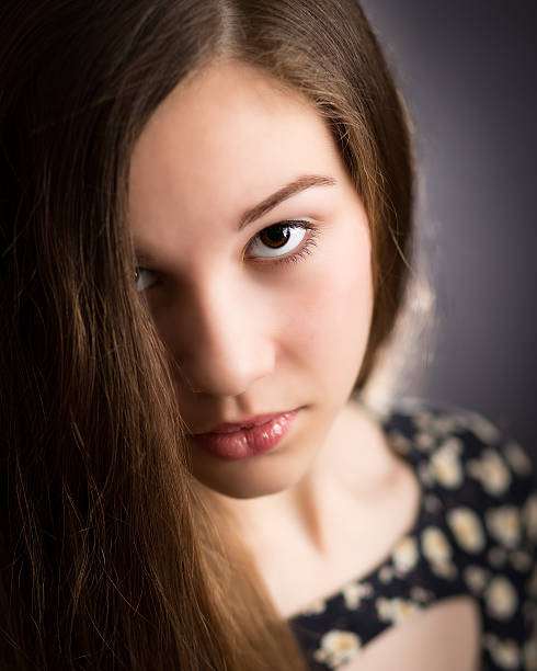 istock Beautiful Teen Girl Looking Up 493565607