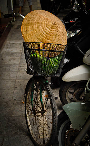 istock Bike with Vietnamese hat and groceries 493566773