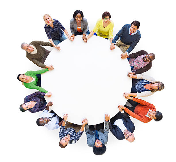 istock Group of People Holding Hands 493567465