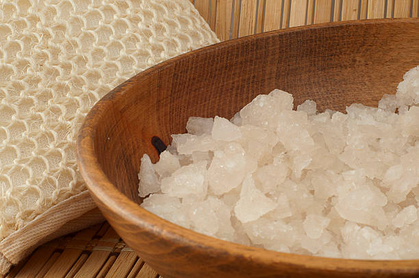 istock sea salt in wooden bowl 493567539