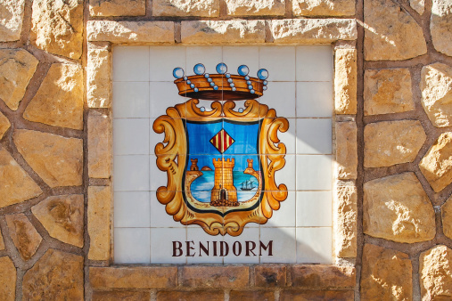 BENIDORM, SPAIN - April 6, 2014: CREST FOR BENIDORM - CIRCA APRIL 2014: colorful sign for Benidorm, taken April 2014 at the fountains in Polop, near Benidorm, Alicante, Costa Blanco, Spain.