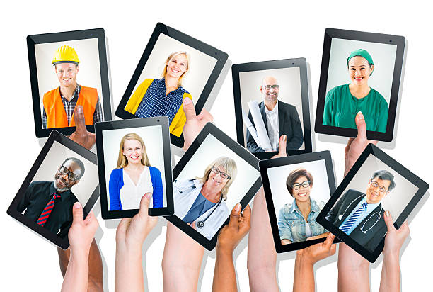 Group of Hands Holding Tablets with People's Faces Group of Hands Holding Tablets with People's Faces various occupations stock pictures, royalty-free photos & images