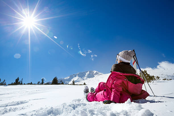 Woman at mountains enjoying in sun