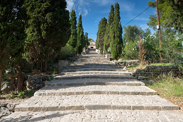 istock 365-step stairway up to a chapel 493577320