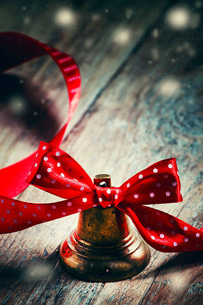 istock Jingle bells with a red ribbon with polka dots 493581358