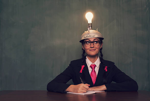 istock Retro Businesswoman with Thinking Cap is Thinking 493584296